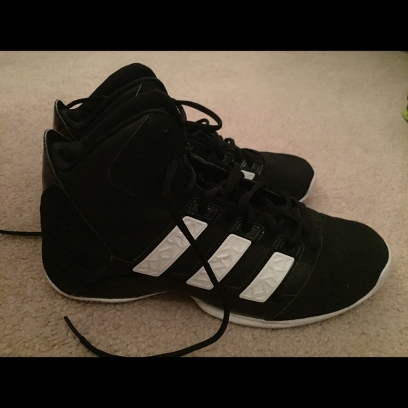 Black and white Adidas basketball shoes