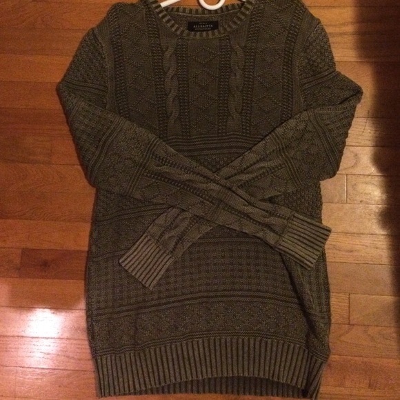 Knit sweater.