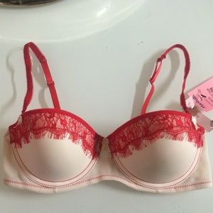 White bra with red lace and little white bows