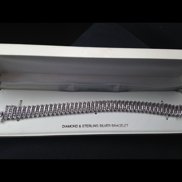 Real Diamond and sterling silver bracelet.