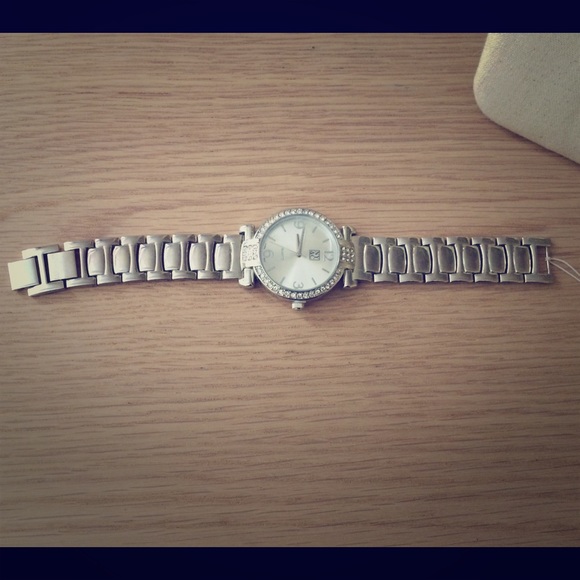 Silver watch with silver gemstones