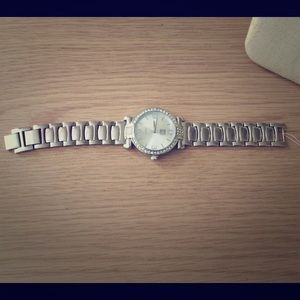 Silver watch with silver gemstones