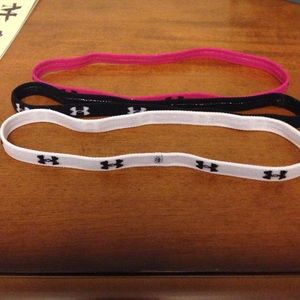 Three under armour headbands. NWOT.  Never worn.