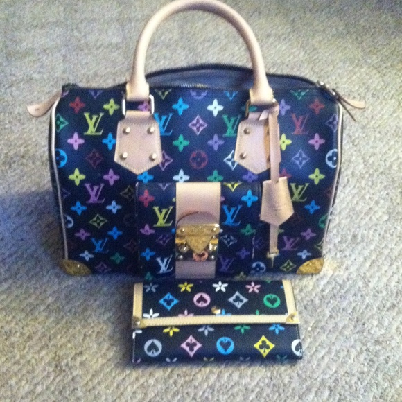 SOLD Black speedy size medium EEUC