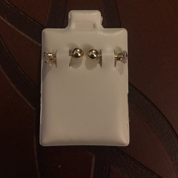 yellow gold screwback earrings.