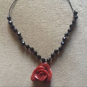 Red and black necklace from Caché , super sexy