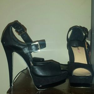 Size 9 black stilettos purchased  from JustFab.