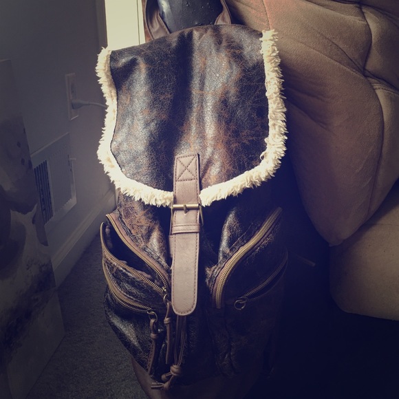 Claire's brown backpack
