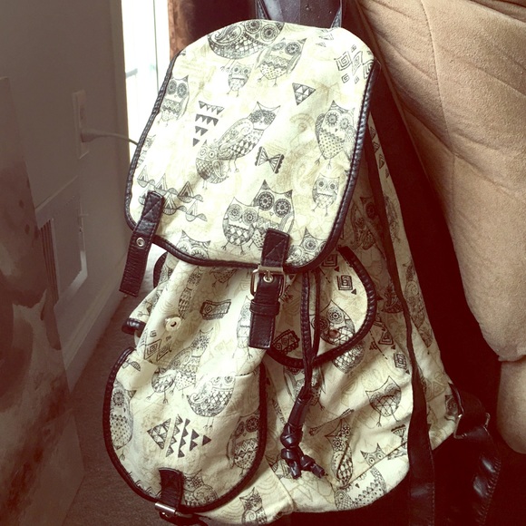 Claire's Black and Tan owl backpack.