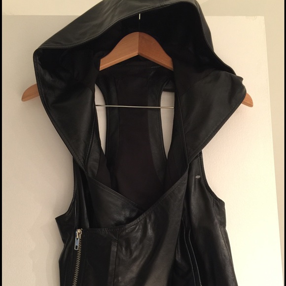 Genuine leather Cabuchon, hooded vest. Dbl breast