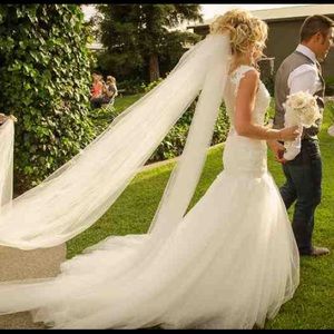 Beaded lace and tulle wedding gown