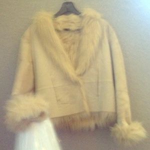 Sued fur reversible coat .