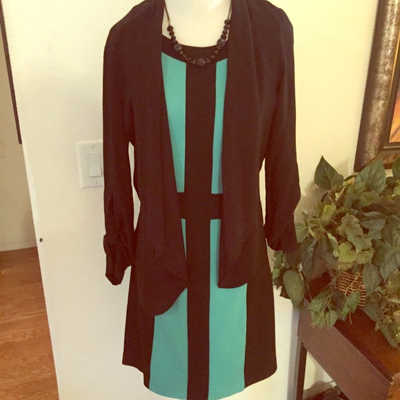 Figure flattering/forgiving dress by Kensie!