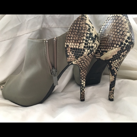 Open toe, snake skin/grey suede, stiletto booties.