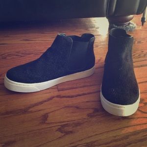 High top slip on sneakers