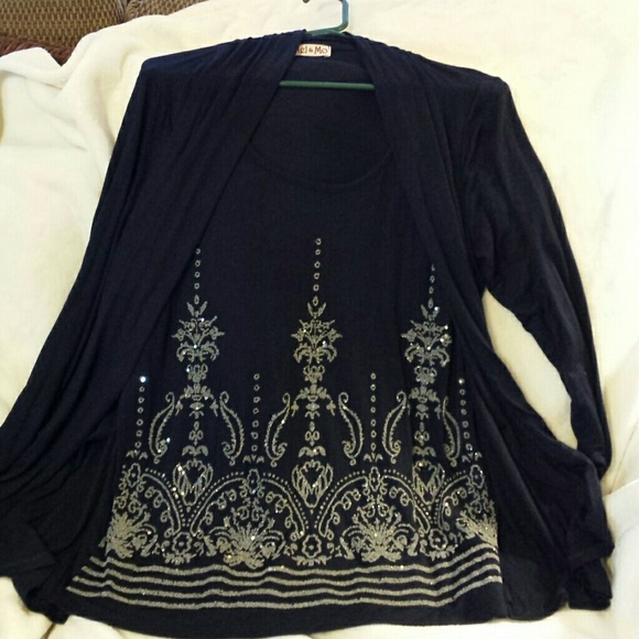 Navy blue long sleeve shirt very sparkly.