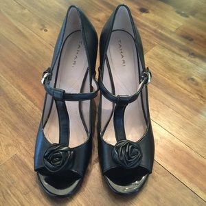 Black tahari heels with flower