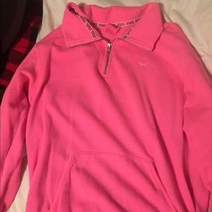 PINK pullover.