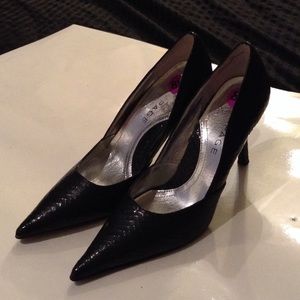 Black pointed toe heels