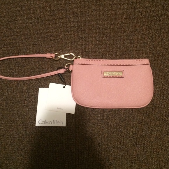 Calvin Klein Handbags - Pink Calvin Klein leather wristlet.