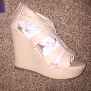 Brand new Nude/Cream wedges