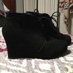Black wedge booties