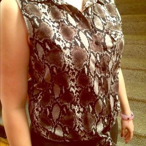 Snake skin print sleeveless button up!