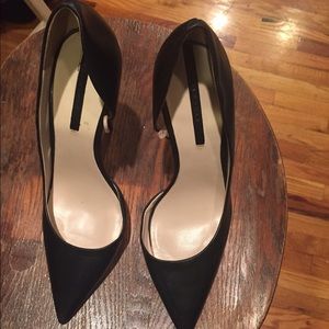 Pointed black heels