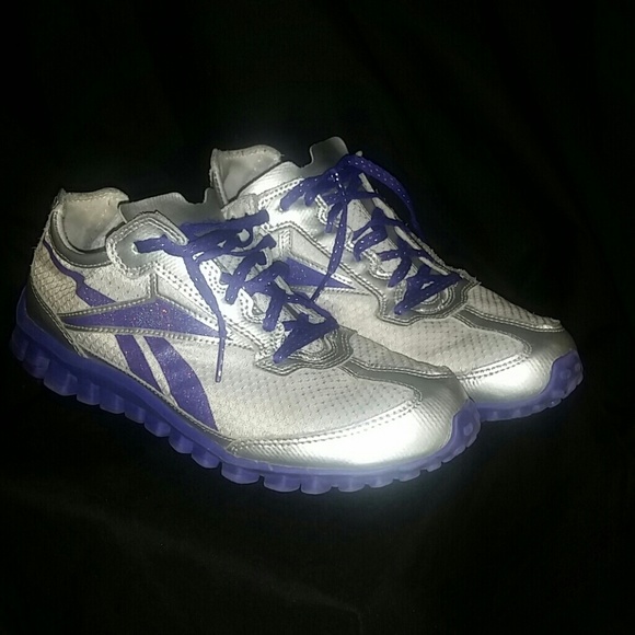 Purple and gray Reebok running shoes