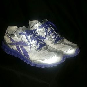 Purple and gray Reebok running shoes