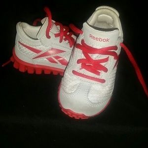 Red and gray toddler Reebok sneakers