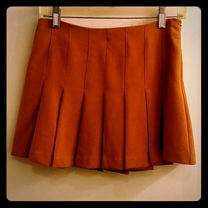 NWOT TAN PLEATED SCHOOL GIRL MINI