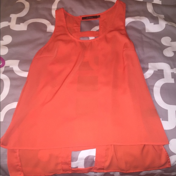 Orange top with cut outs down the back - Picture 2 of 2