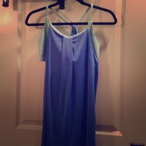 Sports tank with attached built in bra