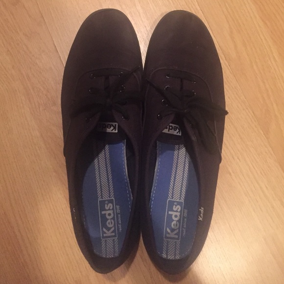 All black Canvas skippies lace up plimsoll shoes