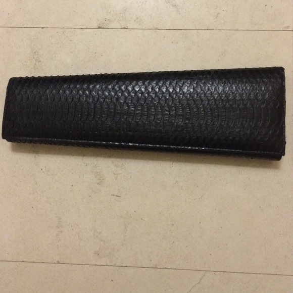 Real Python black leather asymmetrical clutch