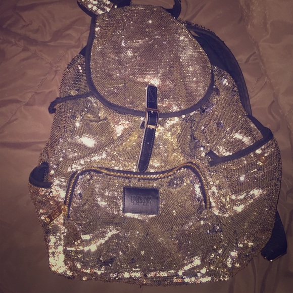 Gold squib Victoria secret back pack.