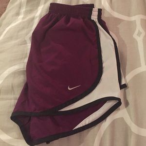 Purple Nike shorts