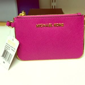 MK Fuschia SM leather wristlet. New with tags