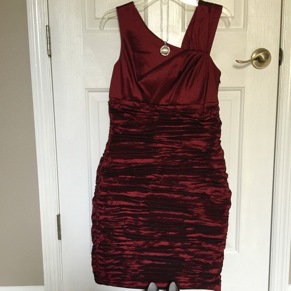 Formal dress. Some shine to material. Lined.NWOT
