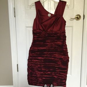 Formal dress. Some shine to material. Lined.NWOT