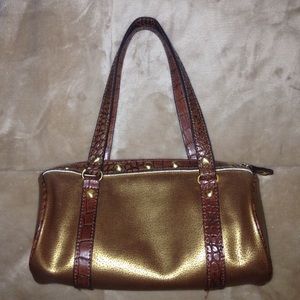 Golden purse. Good condition.