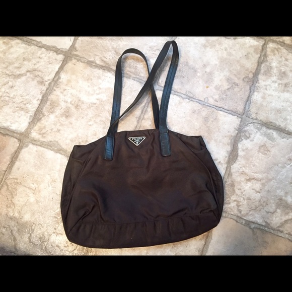 Authentic Prada tote dark brown gently used.