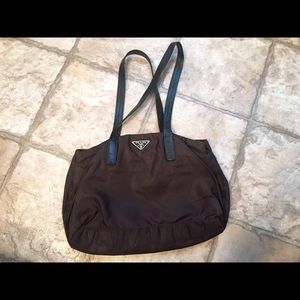 Authentic Prada tote dark brown gently used.