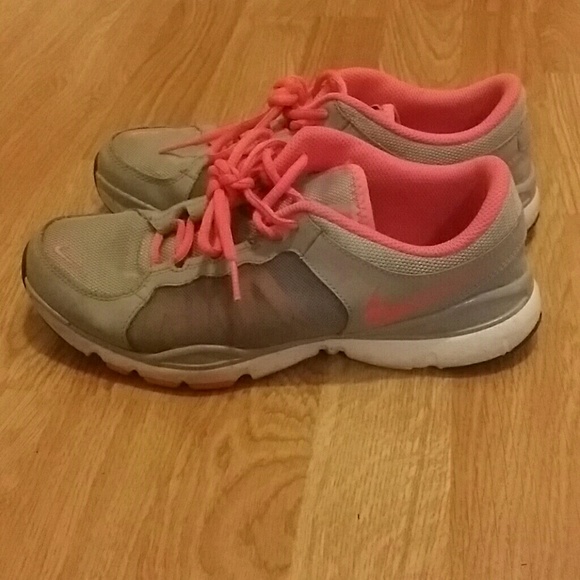 Pink and Gray Nike tennis shoes