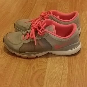 Pink and Gray Nike tennis shoes