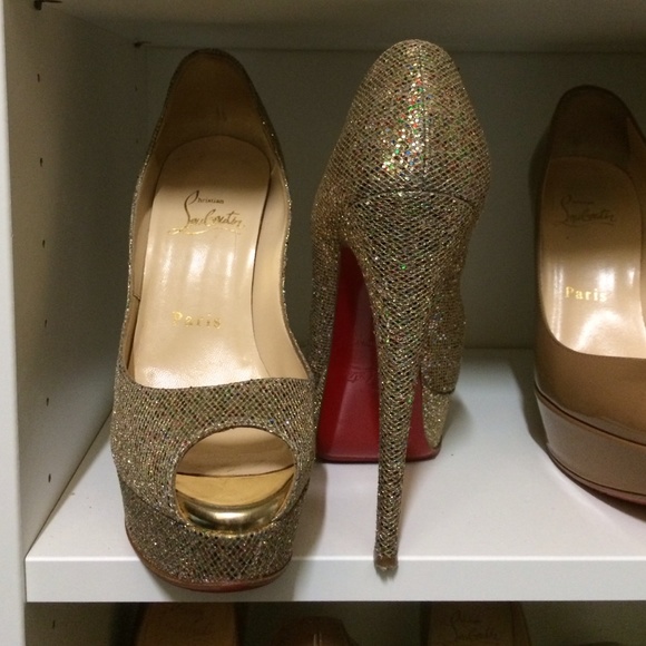 Christian Louboutin gold glitter pumps