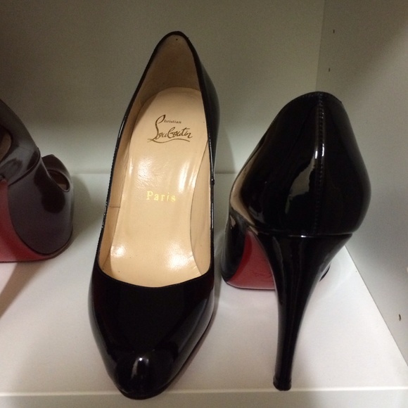 Christian Louboutin Decollette black patent pumps