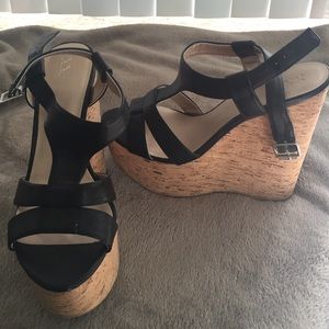 Sky high black strappy sandal wedges