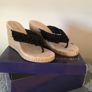 Black wedge flip flops